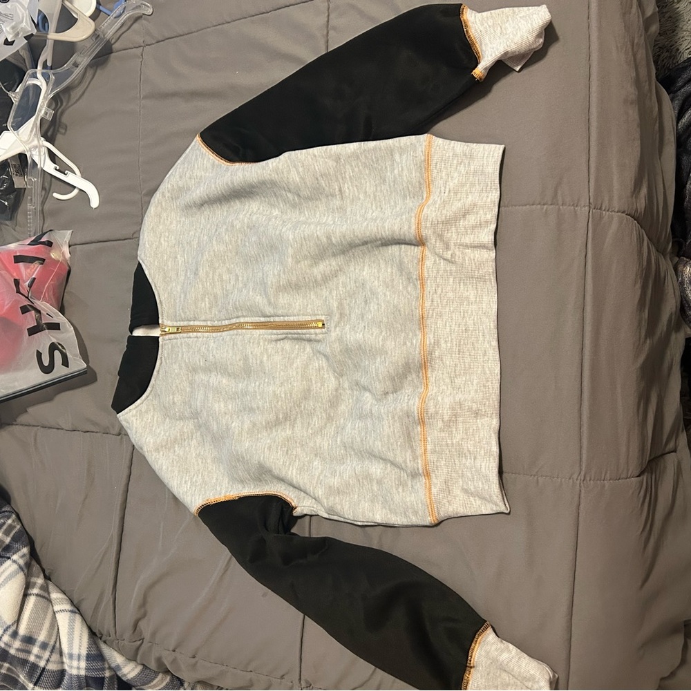 Chic Black and Gray Sweatshirt with Gold Zipper